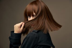 girl with long hair flowing/ hair restoration photo