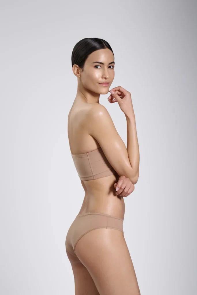 Smiling woman with smooth, contoured skin